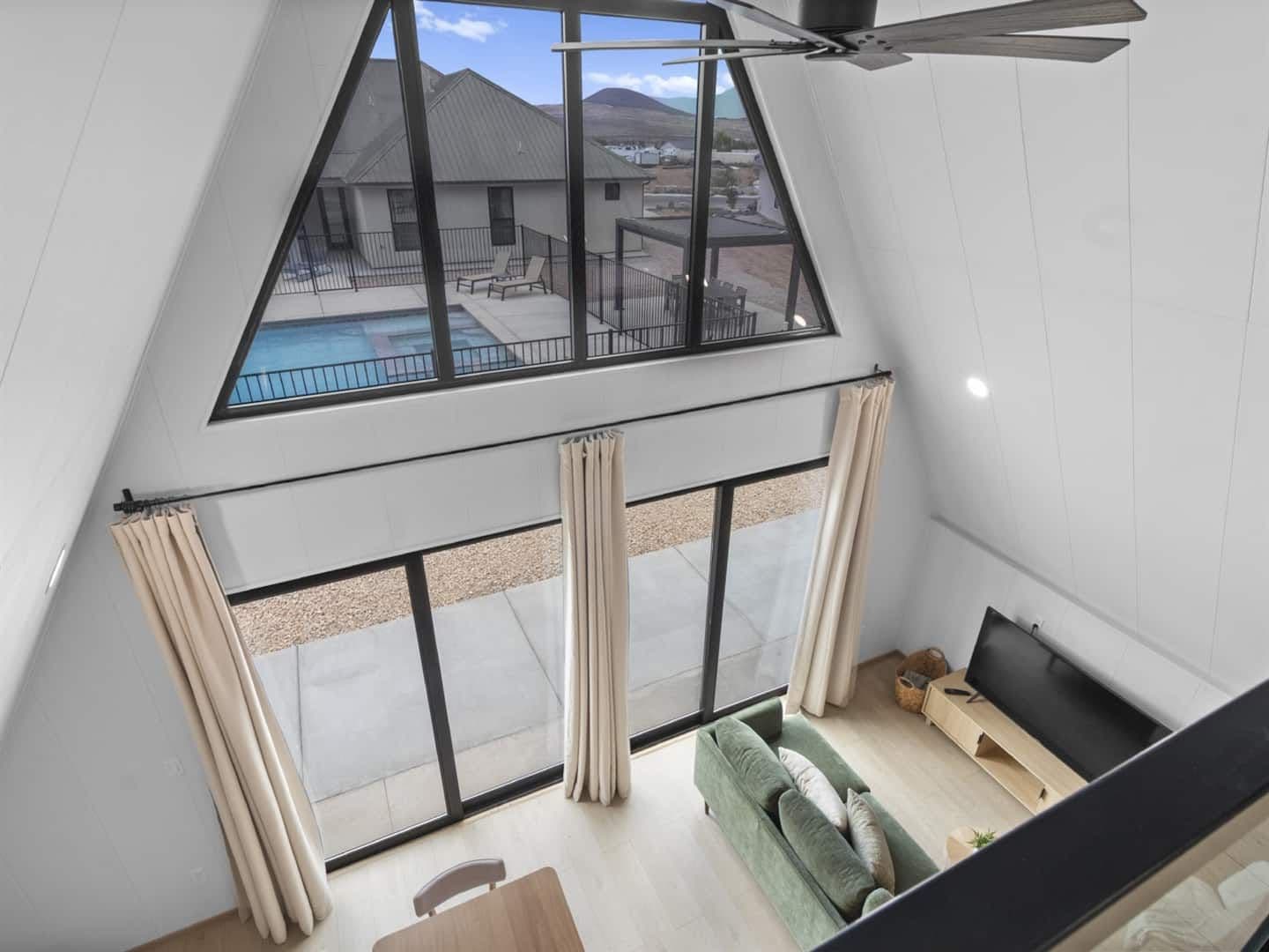 Main Room View of Pool and Pergola