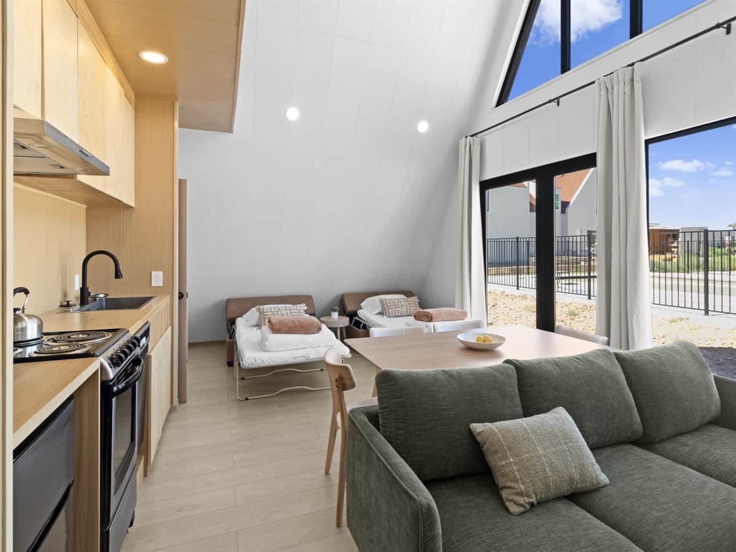 Main Room with Twin Sofa Beds Made Up
