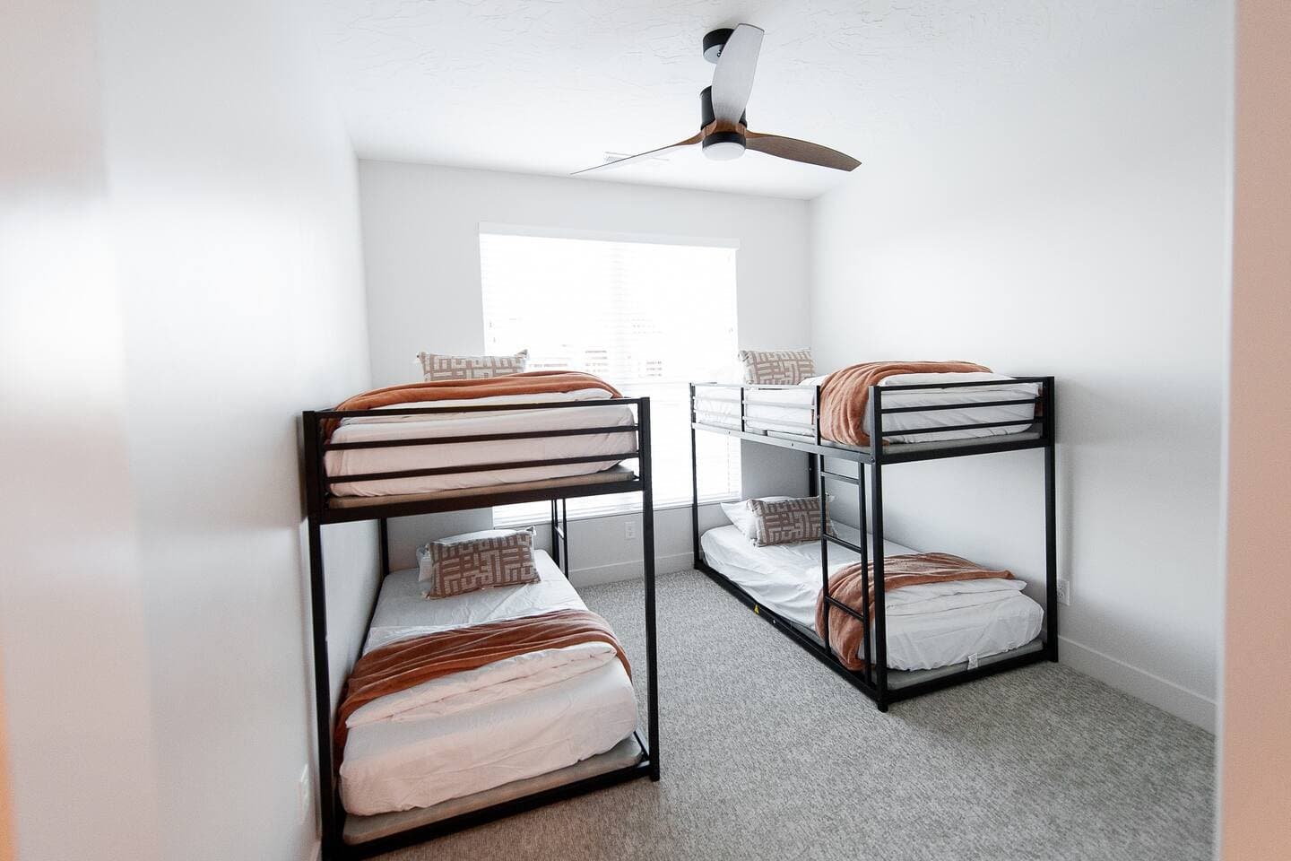 Bunk room with two sets of twin bunks