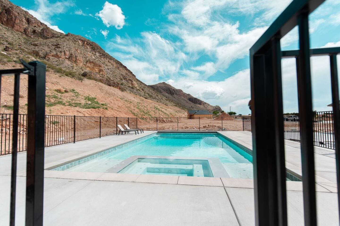 Pool and hot tub under the hillside
